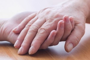 Close-up of women holding each other's hands